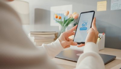 Young asia lady use cellphone order online shopping product and paying bills with banking app with transaction successful. Stay at house, Quarantine activity, Fun activity for coronavirus prevention.